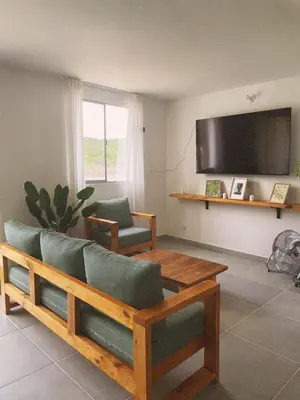 a living room with a couch and a table at Amazing apartment cerca the beach Manzanillo Sector in Cartagena de Indias
