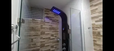 a door with a blue light in a room at Exclusive Full Apartment in Cartagena in Cartagena de Indias
