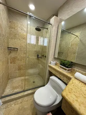 a bathroom with a toilet and a shower at Marabierto Beachfront Escape in Arizona