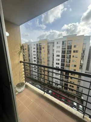 a balcony with a view of some buildings at Apartamento en Barranquilla Alameda del Rio in Barranquilla