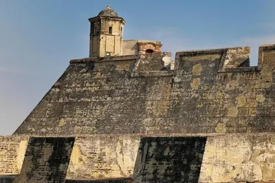 an old building with a clock tower on top of it at City Tour por Cartagena con entradas in Cartagena de Indias