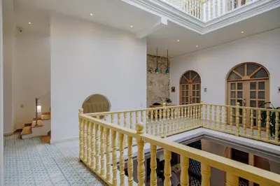 a staircase in a building with a ceiling at La Dominica Hotel Boutique in Cartagena de Indias