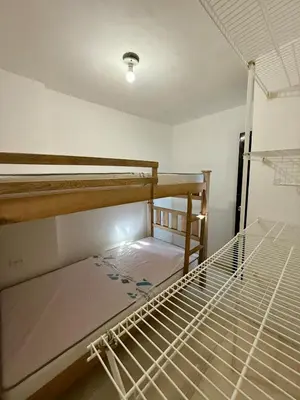 a bedroom with two bunk beds in a room at First floor house in Barranquilla