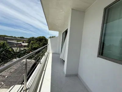 a balcony of a white building with a view at Apartment 402 Tolú 2 habitaciones in Tolú
