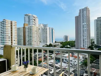 a balcony with a view of a parking lot at Beach Nearby Stunning Views Ultimate Comfort in Cartagena de Indias
