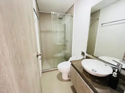 a bathroom with a sink and a toilet at Ocean Drive Cartagena Apto con Piscina Infinity in Cartagena de Indias