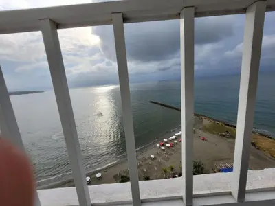a view of the ocean from a balcony at Large and beautiful Oceanfront Penthouse in Cartagena de Indias