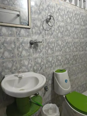 a bathroom with a sink and a toilet at Las Margaritas Frente al Mar 1 in Coveñas
