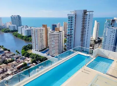 an apartment with a swimming pool on the roof of a building at Sea view apartment in Cartagena de Indias