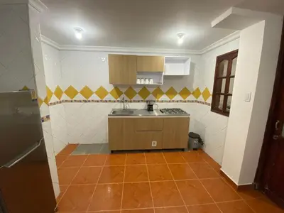 a kitchen with a sink and a counter top at Modern duplex 5 minutes from the Historic Center in Cartagena de Indias