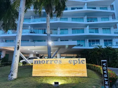 a sign in front of a large building at Apartamento en Cartagena con balcón en Morros in Cartagena de Indias