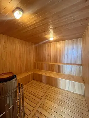 a wooden sauna with a trash can in it at Charming Oceanfront Apartment with Balcony and Panoramic view, Cartagena Colombia in Cartagena de Indias