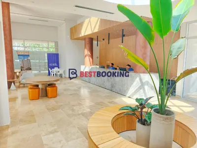 a lobby with a table and a potted plant at Santa Marina Luxury Stay - Ocean View in Estación El Salto