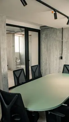 a conference room with a table and chairs at Enjoy the sun and beach in our apartment in Cartagena de Indias
