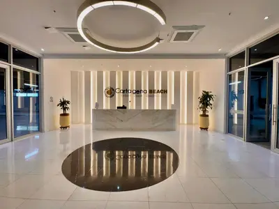a lobby with a reception desk in a building at Loft Vistas Mar. Crespo Piscina y Jacuzzi in Cartagena de Indias