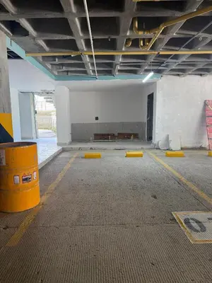 an empty room with yellow barriers in a building at Cartagena Baia kristal Getaway in Cartagena de Indias