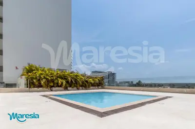 a swimming pool on the roof of a building at Charming Seafront Loft in Cartagena de Indias