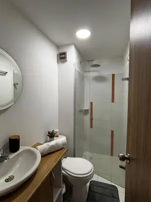 a bathroom with a shower and a toilet and a sink at Apartamento amoblado, cómodo y cerca de lo mejor de la ciudad in Cartagena de Indias