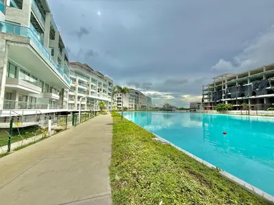 a swimming pool next to some apartment buildings at Baia Krystal P4, 1A in Cartagena de Indias