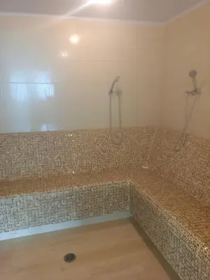 a bathroom with a large tub with a shower at CB Lujoso Apartasuit -Vista al mar-linda piscina-cerca al Aeropuerto in Cartagena de Indias