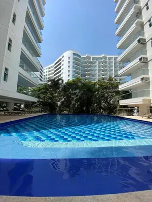 a large swimming pool in front of some buildings at Apartamento en Morros in Cartagena de Indias