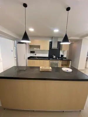 a kitchen with a large island in the middle at Apartamento en Morros in Cartagena de Indias