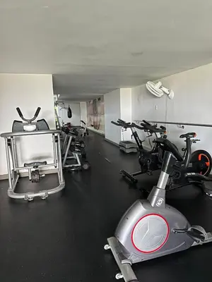a gym with several exercise bikes in a room at Exclusivo Apartamento con playa y piscinas Morros Cartagena in Cartagena de Indias