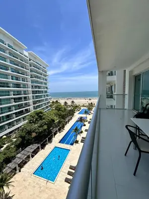 a view of the beach from the balcony of a resort at Exclusivo Apartamento con playa y piscinas Morros Cartagena in Cartagena de Indias