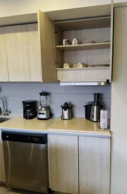 a kitchen counter with pots and pans on it at Exclusive Apartment with Private Jacuzzi in Cartagena de Indias