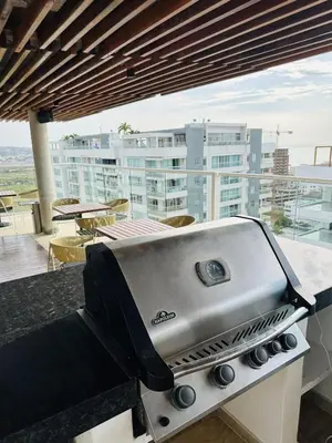 a grill sitting on a counter on a balcony at Exclusive Apartment with Private Jacuzzi in Cartagena de Indias