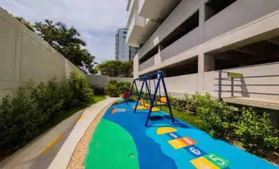 a playground in front of a building at Exclusive Apartment with Private Jacuzzi in Cartagena de Indias