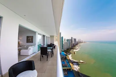 a hotel room with a view of the ocean at luxury Aparment Ocean view H2 condominium apto 2105 in Cartagena de Indias