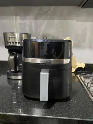 a toaster sitting on a counter in a kitchen at New modern apartment in Barranquilla