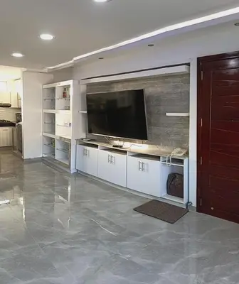 a large living room with a flat screen tv at Apartamento para estrenar in Barranquilla
