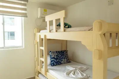 a bunk bed room with two bunk beds at Inca Caribe 302 in Coveñas