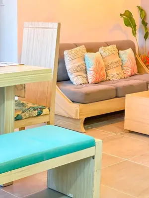 a living room with a couch and a table at Cielo Caribe 501 in Coveñas
