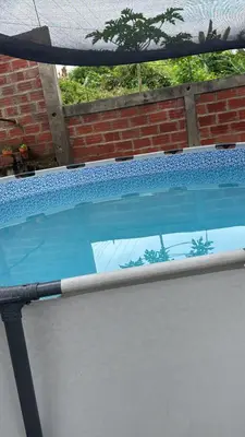 a small swimming pool with a fence around it at Casa Campestre DONDE MAMI ENA in Galapa