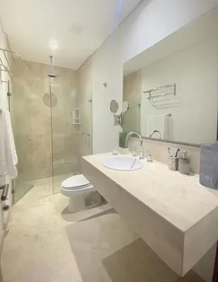 a bathroom with a sink and a toilet and a shower at Apartamento en el centro historico de Cartagena in Cartagena de Indias