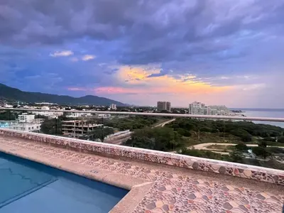 a view of the ocean from a swimming pool at Apartamento con vista al mar en Bello Horizonte, Santa Marta in Santa Marta