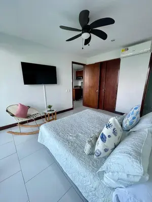 a bedroom with a bed with a ceiling fan at Apartamento en Cartagena cerca al hotel las Américas in Cartagena de Indias