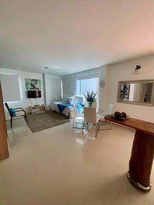 a living room with a couch and a table at Cielo mar 202 frente a hotel Las Américas in Cartagena de Indias