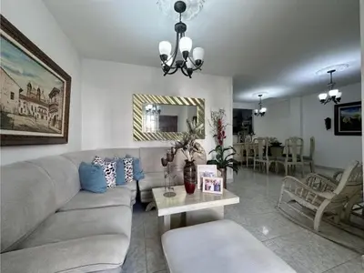 a living room with a couch and a table at Apartamento Pie de la Popa Cartagena - 3 Habitaciones in Cartagena de Indias