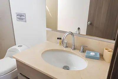 a bathroom with a sink and a toilet at Hermoso Apto 2 Hab Piso 11 en Morros City in Cartagena de Indias