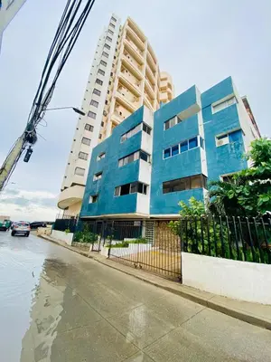 a blue building on the side of a street at Apartamento Los Lagos in Cartagena de Indias
