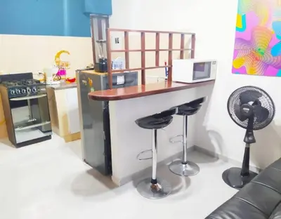 a toy kitchen with a counter and stools at Acogedor apto en el centro historico - CER in Cartagena de Indias
