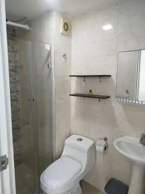 a bathroom with a toilet and a shower and a sink at Cartagena Search in the Historic Center T6 in Cartagena de Indias