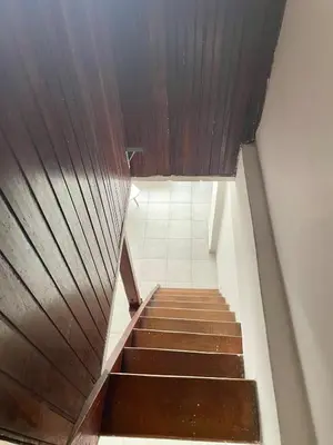 a staircase with a wooden ceiling and a tile floor at Oceanfront accommodation! in Cartagena de Indias