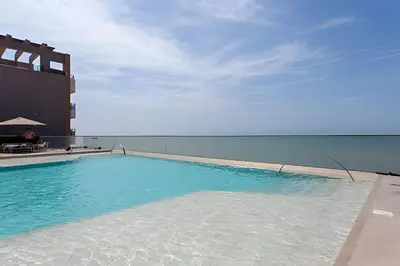 a large swimming pool on top of a building at Lujoso Apto de 1 Habitación en Piso 14-Morros City in Cartagena de Indias