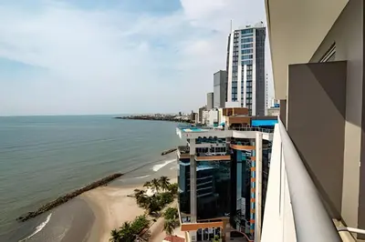 a view of the ocean from the balcony of a building at Lujoso Apto de 1 Habitación en Piso 14-Morros City in Cartagena de Indias