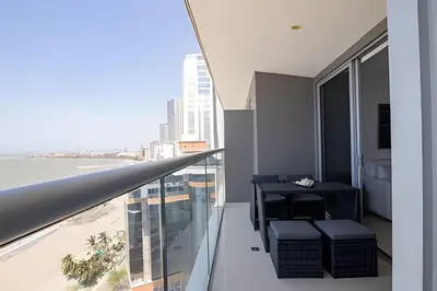 an apartment balcony with a view of the city at Lujoso Apto de 1 Habitación en Piso 14-Morros City in Cartagena de Indias